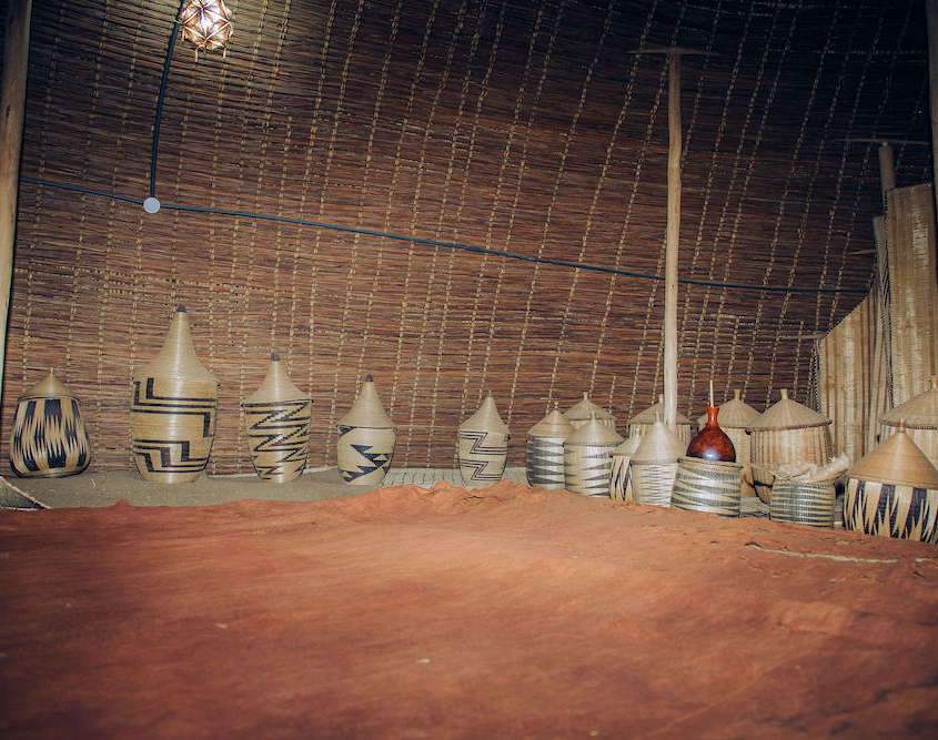 National Museum of Rwanda. King's Bedroom with woven grass storage containers.