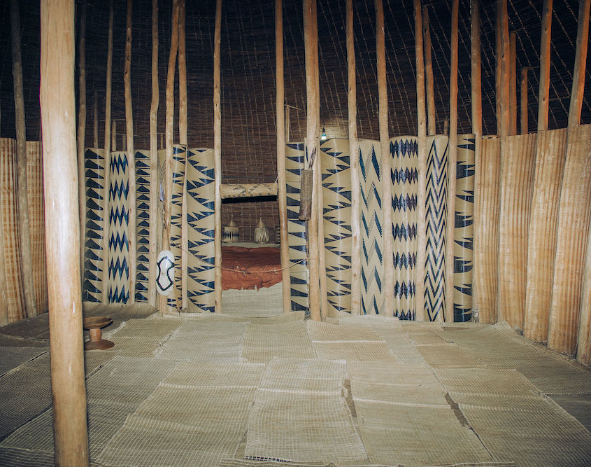 National Museum of Rwanda. Inside of King's house showing doorway to king's bedroom and ornamented screenings