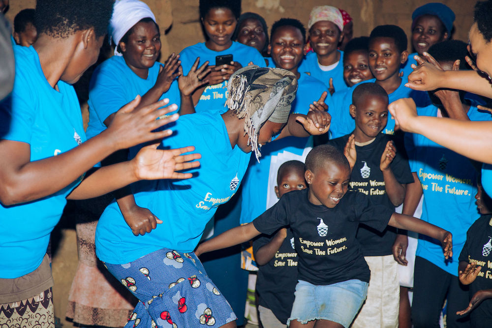 A gathering frequently draws song, dance and joy filled laughter... with children excited to join in.